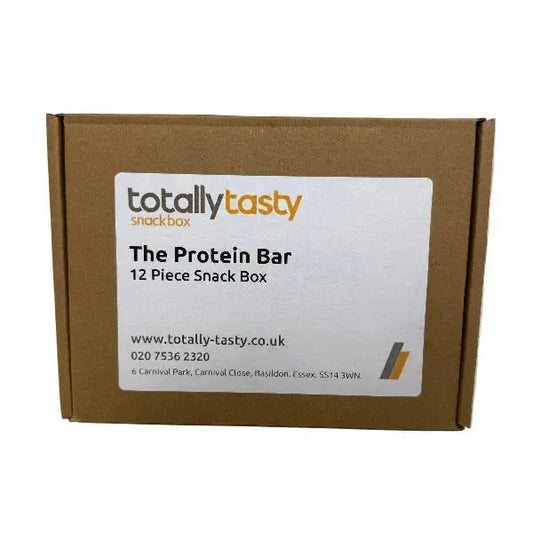 Cardboard box with 'totally tasty' Protein Bar snack box label on a white surface