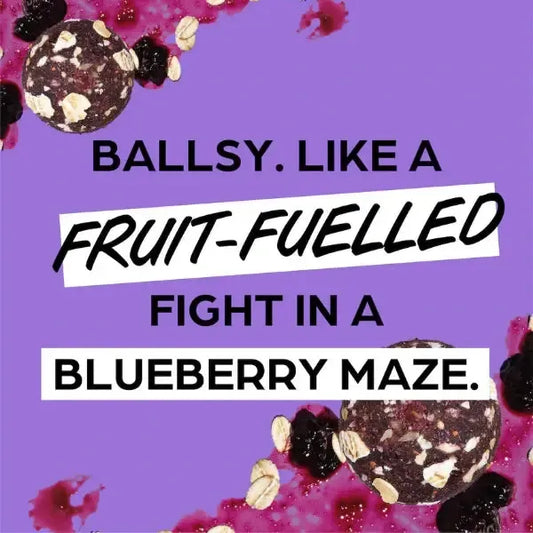 Text on a purple background with blueberries and chocolate balls