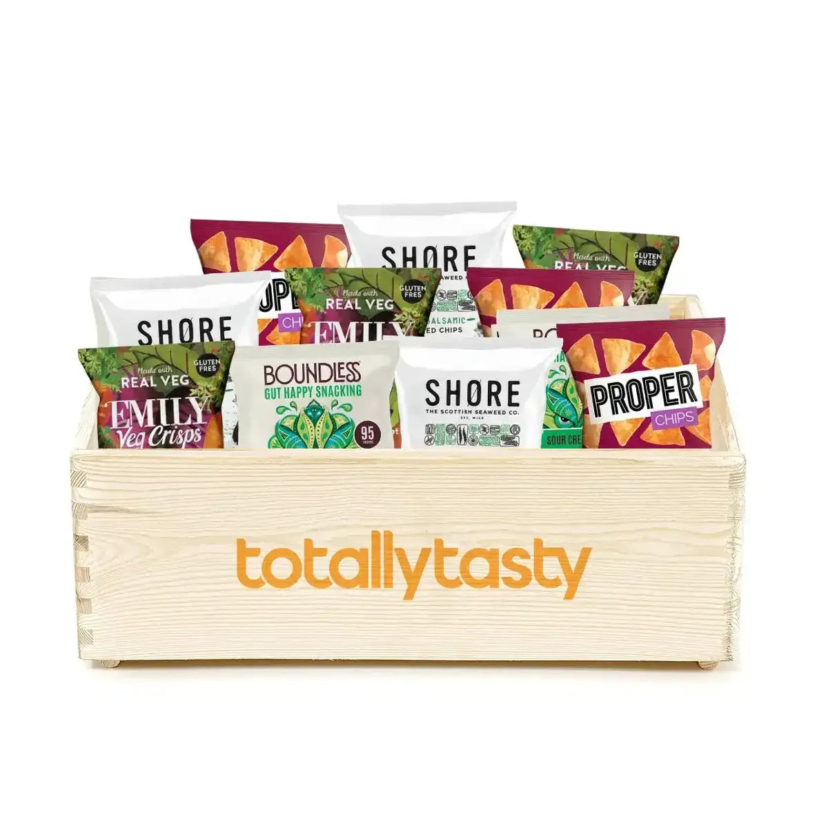 Assorted snack bags in a wooden crate with 'totallytasty' branding on a white background