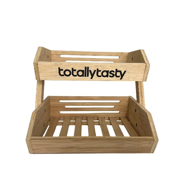 Wooden 2 Tier snack disaply unit with 'totallytasty' branding on a white surface.