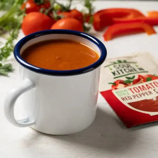 mage of Soul Kitchen mexican style tomato and red pepper soup in a mug on a table