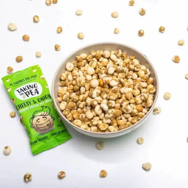 Bowl of Taking The Pea cheesy and onion flavour next to a snack packet on a white background