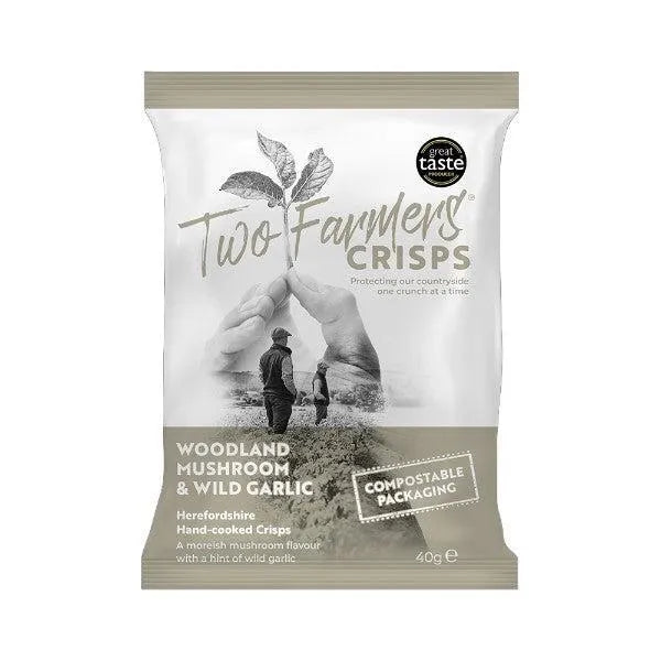 Two Farmers Crisps Woodland Mushroom and wild garlic flavour packaging with a man and woman in a field on a white background