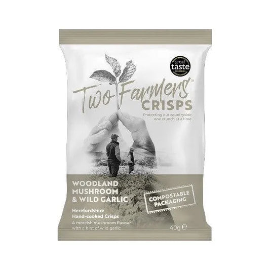Two Farmers Crisps Woodland Mushroom and wild garlic flavour packaging with a man and woman in a field on a white background